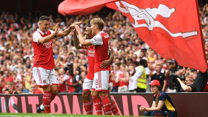 LONDON, ENGLAND - JULY 30: (2ndR) Gabriel Jesus celebrates scoring the 3rd Arsenal goal with (L) Granit Xhaka and (R) Martin Odegaard during the Emirates Cup match between Arsenal and Seville at Emirates Stadium on July 30, 2022 in London, England. (Photo by Stuart MacFarlane/Arsenal FC via Getty Images)