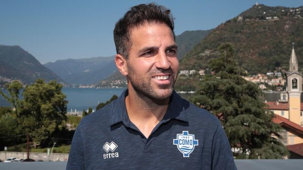 COMO, ITALY - AUGUST 01: New Como 1907 signing Cesc Fabregas poses at Hilton Lake Como on August 01, 2022 in Como, Italy. (Photo by Emilio Andreoli/Getty Images)