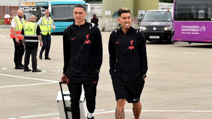 LIVERPOOL, ENGLAND - JULY 21: (THE SUN OUT, THE SUN ON SUNDAY OUT) Roberto Firmino and Darwin Nunez of Liverpool departing for pre season training camp at Liverpool John Lennon Airport on July 21, 2022 in Liverpool, England. (Photo by Andrew Powell/Liverpool FC via Getty Images)