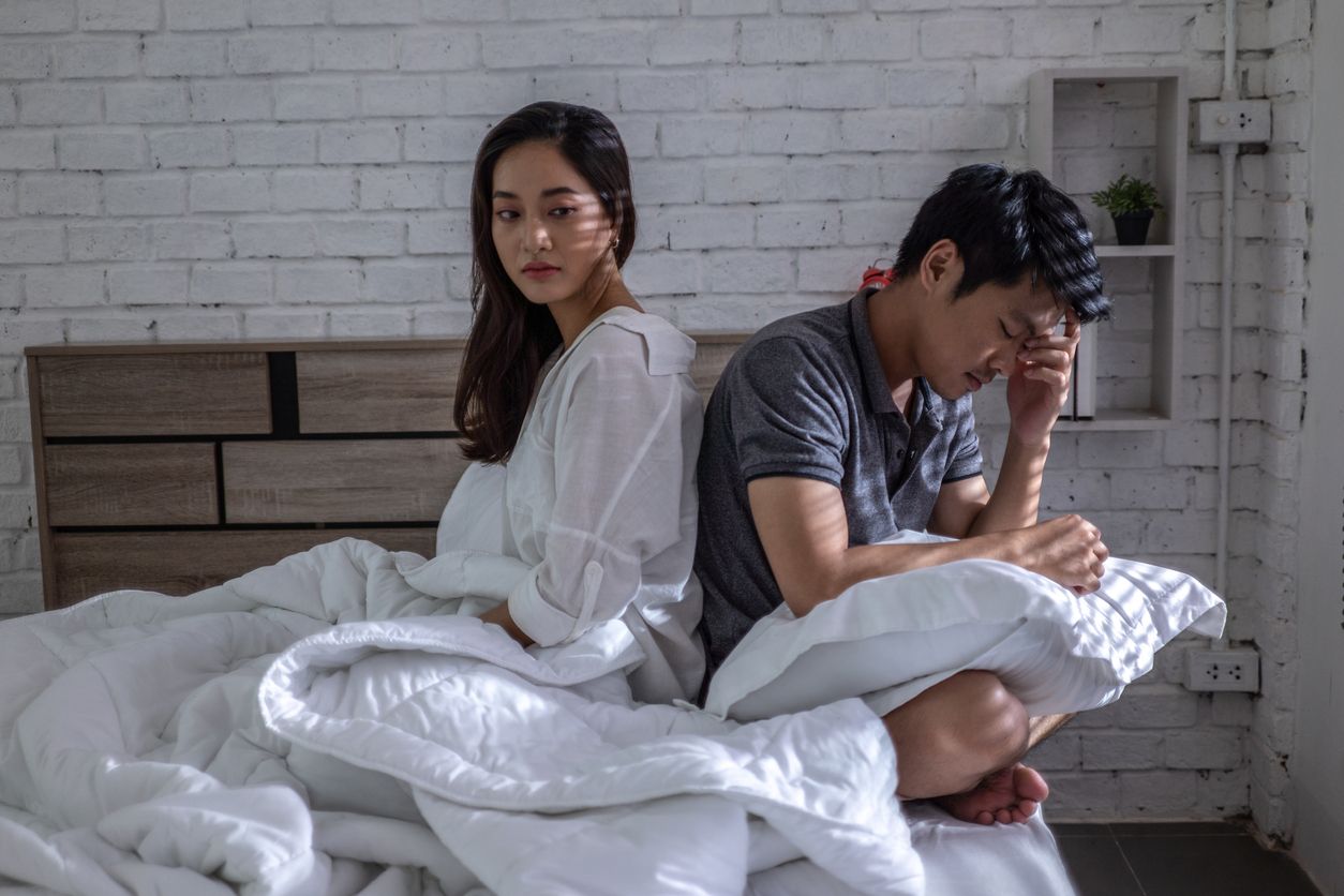 Lovers, they have problems with quarrel. They are in bed. they don't talk.Bored of life after marriage