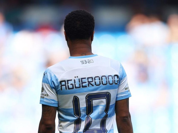MANCHESTER, ENGLAND - MAY 08: Raheem Sterling of Manchester City, whilst wearing a limited edition shirt to commemorate the 10 Year Anniversary of the Premier League title winning goal scored by former player Sergio Aguero ( not pictured ), prior to kick off of the Premier League match between Manchester City and Newcastle United at Etihad Stadium on May 08, 2022 in Manchester, England. (Photo by Matt McNulty - Manchester City/Manchester City FC via Getty Images)