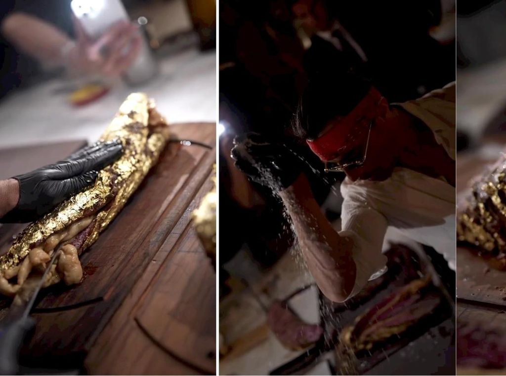 Salt Bae Sajikan Tomahawk Steak Berlapis Emas 24 Karat di Acara Gold Night Salt Bae Sajikan Tomahawk Steak Berlapis Emas 24 Karat di Acara Gold Night