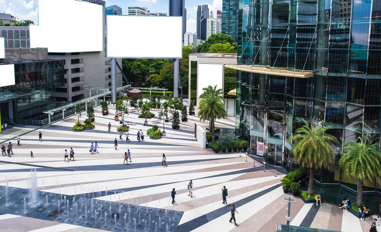 Empty billboards, People walking in front of Siam Paragon Department Store at Sukhumvit road Pathumwan Bangkok Thailand, June 3, 2020