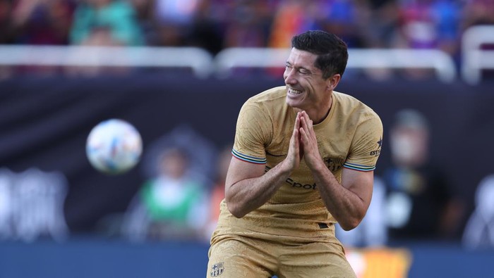 DALLAS, TX - JULY 26: Robert Lewandowski #12 of Barcelona reacts after missing a chance to score during the preseason friendly match between FC Barcelona and Juventus FC at Cotton Bowl on July 26, 2022 in Dallas, Texas. (Photo by Omar Vega/Getty Images)