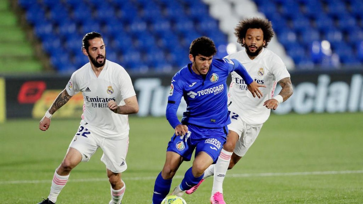 Isco (kiri) dan Marcelo (kanan) saat masih membela Real Madrid. Foto: Getty Images/Soccrates Images