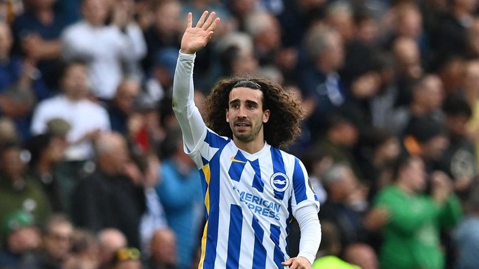 Brightons Spanish defender Marc Cucurella celebrates after scoring their second goal during the English Premier League football match between Brighton and Hove Albion and Manchester United at the American Express Community Stadium in Brighton, southern England on May 7, 2022. - RESTRICTED TO EDITORIAL USE. No use with unauthorized audio, video, data, fixture lists, club/league logos or live services. Online in-match use limited to 120 images. An additional 40 images may be used in extra time. No video emulation. Social media in-match use limited to 120 images. An additional 40 images may be used in extra time. No use in betting publications, games or single club/league/player publications. (Photo by Glyn KIRK / AFP) / RESTRICTED TO EDITORIAL USE. No use with unauthorized audio, video, data, fixture lists, club/league logos or live services. Online in-match use limited to 120 images. An additional 40 images may be used in extra time. No video emulation. Social media in-match use limited to 120 images. An additional 40 images may be used in extra time. No use in betting publications, games or single club/league/player publications. / RESTRICTED TO EDITORIAL USE. No use with unauthorized audio, video, data, fixture lists, club/league logos or live services. Online in-match use limited to 120 images. An additional 40 images may be used in extra time. No video emulation. Social media in-match use limited to 120 images. An additional 40 images may be used in extra time. No use in betting publications, games or single club/league/player publications. (Photo by GLYN KIRK/AFP via Getty Images)