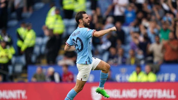 Manchester Citys Bernardo Silva celebrates the goal of team-mate Julian Alvarez (not pictured) during the FA Community Shield match at the King Power Stadium, Leicester. Picture date: Saturday July 30, 2022. (Photo by Joe Giddens/PA Images via Getty Images)