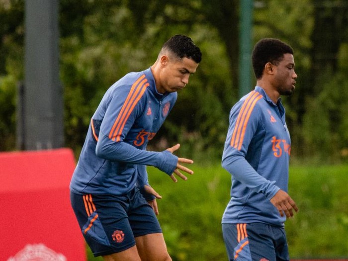 MANCHESTER, ENGLAND - AUGUST 03: (EXCLUSIVE COVERAGE) Cristiano Ronaldo of Manchester United in action during a first team training session at Carrington Training Ground on August 03, 2022 in Manchester, England. (Photo by Ash Donelon/Manchester United via Getty Images)
