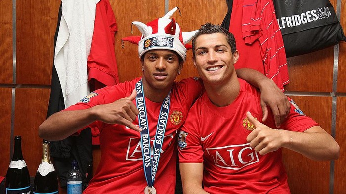 MANCHESTER, ENGLAND - MAY 16:  (EXCLUSIVE ACCESS - MINIMUM USAGE FEE APPLIES - 250 GBP OR LOCAL EQUIVALENT) Nani and Cristiano Ronaldo of Manchester United celebrate in the dressing room after the Barclays Premier League match between Manchester United and Arsenal at Old Trafford on May 16 2009, in Manchester, England. (Photo by Matthew Peters/Manchester United via Getty Images)