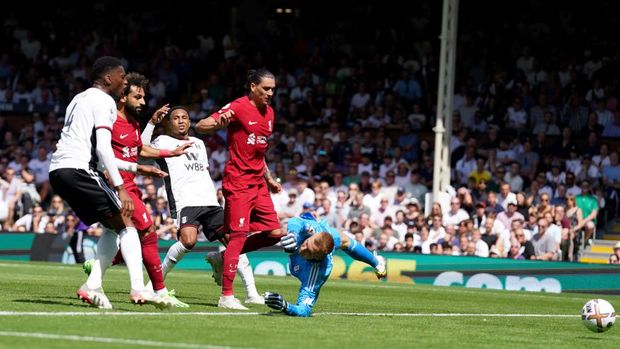 Liverpool's Mohamed Salah (second left) scores their side's second goal of the game during the Premier League match at Craven Cottage, London. Picture date: Saturday August 6, 2022. (Photo by Adam Davy/PA Images via Getty Images)