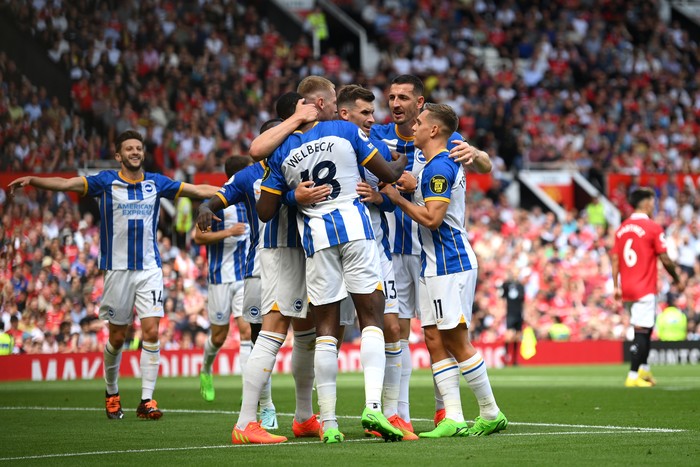 MANCHESTER, ENGLAND - AUGUST 07: Pascal Gross of Brighton & Hove Albion celebrates with teammates after scoring their teams first goal  during the Premier League match between Manchester United and Brighton & Hove Albion at Old Trafford on August 07, 2022 in Manchester, England. (Photo by Michael Regan/Getty Images)