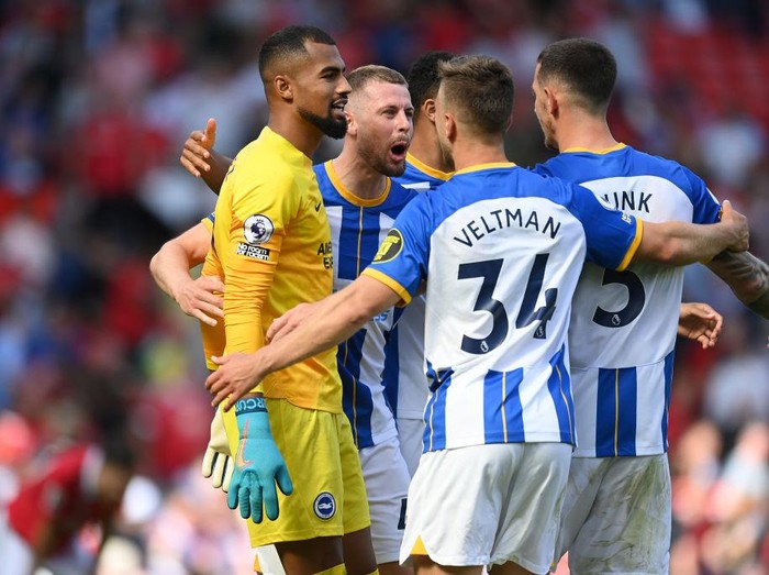 MANCHESTER, ENGLAND - AUGUST 07: Robert Sanchez, Adam Webster, Joel Veltman and Lewis Dunk of Brighton celebrate after the Premier League match between Manchester United and Brighton & Hove Albion at Old Trafford on August 07, 2022 in Manchester, England. (Photo by Michael Regan/Getty Images)