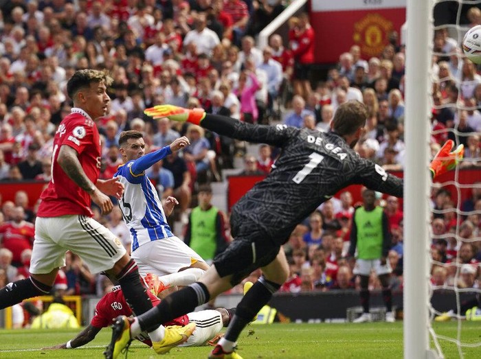 Brighton's Pascal Gross celebrates after scoring his side's opening goal during the English Premier League soccer match between Manchester United and Brighton at Old Trafford stadium in Manchester, England, Sunday, Aug. 7, 2022. (AP Photo/Dave Thompson)
