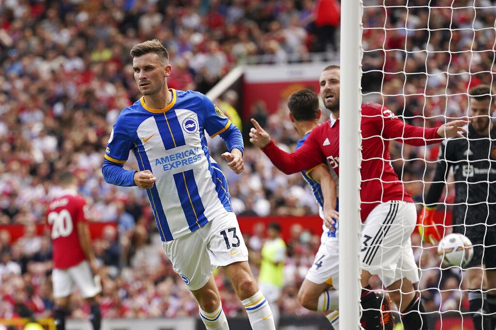 Brighton's Pascal Gross celebrates after scoring his side's opening goal during the English Premier League soccer match between Manchester United and Brighton at Old Trafford stadium in Manchester, England, Sunday, Aug. 7, 2022. (AP Photo/Dave Thompson)
