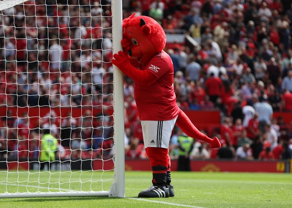 MANCHESTER, ENGLAND - AUGUST 07: Manchester United mascot Fred the Red during the Premier League match between Manchester United and Brighton & Hove Albion at Old Trafford on August 07, 2022 in Manchester, England. (Photo by Catherine Ivill/Getty Images)