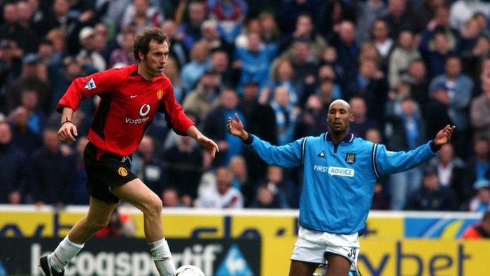 Laurent Blanc Manchester United's Laurent Blanc dribbles the ball past Manchester City's Nicolas Anelka who remains on the turf following a challenge (Photo by Neal Simpson/EMPICS via Getty Images)