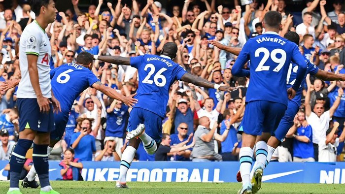 Chelseas Senegalese defender Kalidou Koulibaly (C) celebrates after scoring the opening goal of the English Premier League football match between Chelsea and Tottenham Hotspur at Stamford Bridge in London on August 14, 2022. - RESTRICTED TO EDITORIAL USE. No use with unauthorized audio, video, data, fixture lists, club/league logos or live services. Online in-match use limited to 120 images. An additional 40 images may be used in extra time. No video emulation. Social media in-match use limited to 120 images. An additional 40 images may be used in extra time. No use in betting publications, games or single club/league/player publications. (Photo by Glyn KIRK / AFP) / RESTRICTED TO EDITORIAL USE. No use with unauthorized audio, video, data, fixture lists, club/league logos or live services. Online in-match use limited to 120 images. An additional 40 images may be used in extra time. No video emulation. Social media in-match use limited to 120 images. An additional 40 images may be used in extra time. No use in betting publications, games or single club/league/player publications. / RESTRICTED TO EDITORIAL USE. No use with unauthorized audio, video, data, fixture lists, club/league logos or live services. Online in-match use limited to 120 images. An additional 40 images may be used in extra time. No video emulation. Social media in-match use limited to 120 images. An additional 40 images may be used in extra time. No use in betting publications, games or single club/league/player publications. (Photo by GLYN KIRK/AFP via Getty Images)