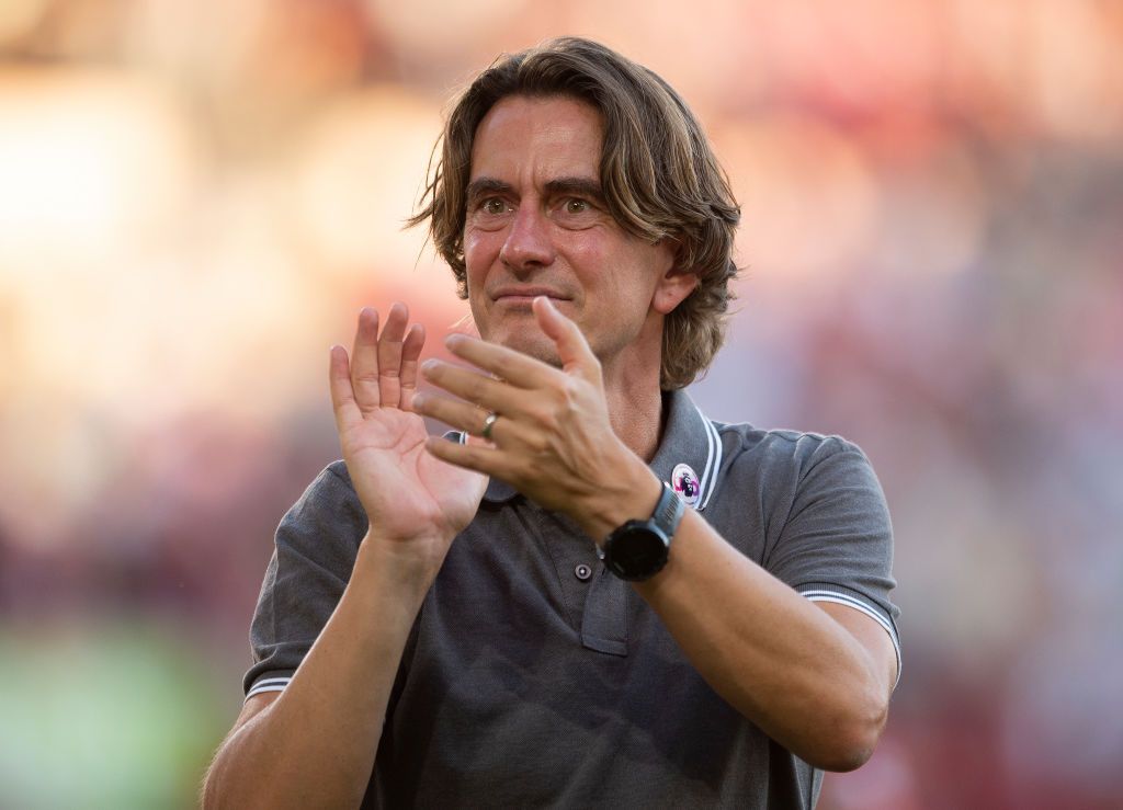 BRENTFORD, ENGLAND - AUGUST 13: Mathias Jensen celebrates scoring Brentford's second goal with Rico Henry during the Premier League match between Brentford FC and Manchester United at Brentford Community Stadium on August 13, 2022 in Brentford, United Kingdom. (Photo by Visionhaus/Getty Images)