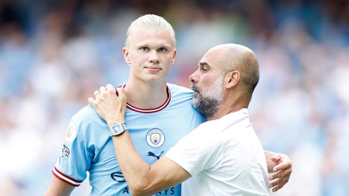Erling Haaland MANCHESTER, ENGLAND - AUGUST 13: Erling Haaland of Manchester City is challenged by Jefferson Lerma of AFC Bournemouth during the Premier League match between Manchester City and AFC Bournemouth at Etihad Stadium on August 13, 2022 in Manchester, England. (Photo by Alex Livesey/Getty Images)
