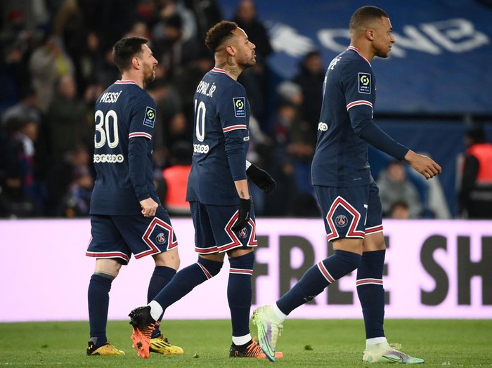 Paris Saint-Germain's Brazilian forward Neymar (C) celebrates with Paris Saint-Germain's French forward Kylian Mbappe (R) and Paris Saint-Germain's Argentinian forward Lionel Messi (L) after scoring the 5-1 goal during the French L1 football match between Paris Saint-Germain (PSG) and FC Lorient at the Parc des Princes stadium in Paris on April 3, 2022. (Photo by FRANCK FIFE / AFP) (Photo by FRANCK FIFE/AFP via Getty Images)