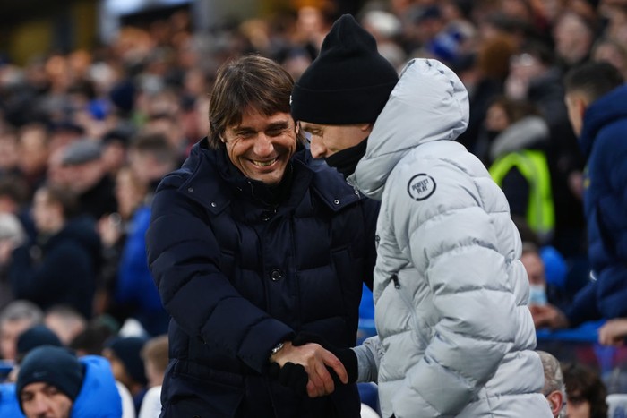 LONDON, ENGLAND - JANUARY 23: Antonio Conte (L), Manager of Tottenham Hotspur greets Thomas Tuchel, Manager of Chelsea prior to the Premier League match between Chelsea and Tottenham Hotspur at Stamford Bridge on January 23, 2022 in London, England. (Photo by Darren Walsh/Chelsea FC via Getty Images)