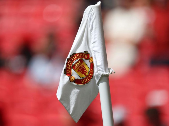 MANCHESTER, ENGLAND - AUGUST 07: Detailed view of a corner flag with the Manchester United badge on ahead of the Premier League match between Manchester United and Brighton & Hove Albion at Old Trafford on August 07, 2022 in Manchester, England. (Photo by Catherine Ivill/Getty Images)