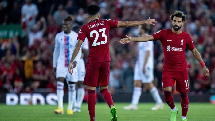 LIVERPOOL, ENGLAND - AUGUST 15: Luis Diaz of Liverpool FC celebrates with Mohamed Salah of Liverpool FC after scoring goal during the Premier League match between Liverpool FC and Crystal Palace at Anfield on August 15, 2022 in Liverpool, United Kingdom. (Photo by Sebastian Frej/MB Media/Getty Images)