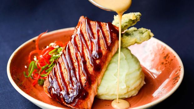BETHESDA, MD  - JUNE 19: Urban Heights' Salmon with hoisin glaze, wasabi mashed potatoes and tempura asparagus. (Photo by Dixie D. Vereen/For The Washington Post via Getty Images)