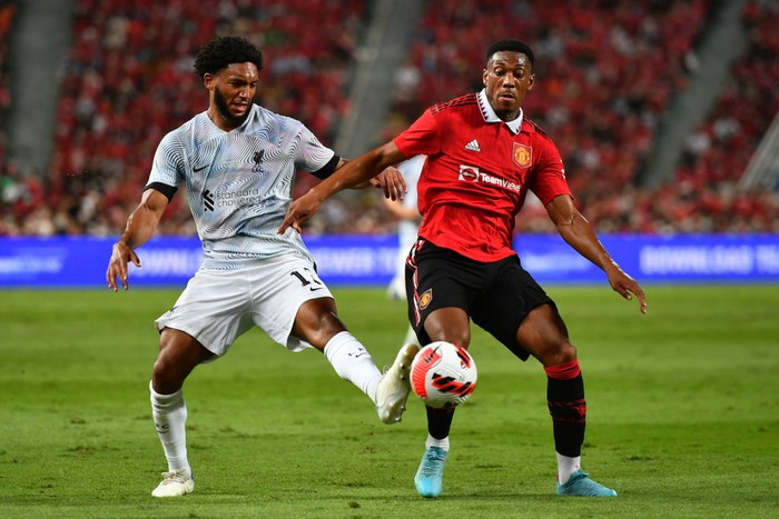BANGKOK, THAILAND - JULY 12: Joe Gomez of Liverpool battles with Anthony Martial of Manchester United during the preseason friendly match between Liverpool and Machester United at Rajamangala Stadium on July 12, 2022 in Bangkok, Thailand. (Photo by MB Media/Getty Images)