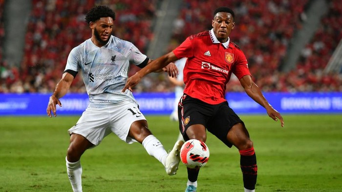 BANGKOK, THAILAND - JULY 12: Joe Gomez of Liverpool battles with Anthony Martial of Manchester United during the preseason friendly match between Liverpool and Machester United at Rajamangala Stadium on July 12, 2022 in Bangkok, Thailand. (Photo by MB Media/Getty Images)