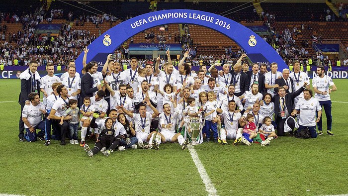 Raphael Varane, Cristiano Ronaldo, Casemiro Real Madrid winner of UEFA Champions League 2015 2016 with Champions League trophy, Coupe des clubs Champions Europeeens, Cristiano Ronaldo of Real Madrid, Karim Benzema of Real Madrid. Luka Modric of Real Madrid, Gareth Bale of Real Madrid, Toni Kroos of Real Madrid, Daniel Carvajal of Real Madrid, Marcelo of Real Madrid, Casemiro of Real Madrid, Pepe of Real Madrid, goalkeeper Keylor Navas of Real Madrid, Sergio Ramos of Real Madrid, Raphael Varane of Real Madrid, Nacho of Real Madrid, James Rodriguez of Real Madrid, goalkeeper Kiko Casilla of Real Madrid, coach Zinedine Zidane of Real Madrid, Mateo Kovacic of Real Madrid, Alvaro Arbeloa of Real Madrid, Lucas Vazquez of Real Madrid, Jese of Real Madrid, Isco of Real Madrid, Danilo of Real Madrid, during the UEFA Champions League final match between Real Madrid and Atletico Madrid on May 28, 2016 at the Giuseppe Meazza San Siro stadium in Milan, Italy.(Photo by VI Images via Getty Images)