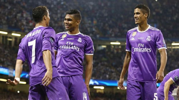 Real Madrid Cristiano Ronaldo celebrating with Casemiro and Raphael Varane of Real Madrid the UEFA Champions League Final between Juventus and Real Madrid at National Stadium of Wales on June 3, 2017 in Cardiff, Wales.(Photo by Matteo Ciambelli/NurPhoto via Getty Images)
