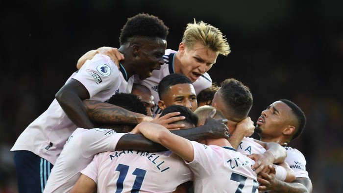 LONDON, ENGLAND - AUGUST 05: (L-R) Bukayo Saka, Martin Odegaard, William Saliba and Gabriel Jesus celebrate the 1st Arsenal goal, scored by Gabriel Martinelli during the Premier League match between Crystal Palace and Arsenal FC at Selhurst Park on August 05, 2022 in London, England. (Photo by Stuart MacFarlane/Arsenal FC via Getty Images)