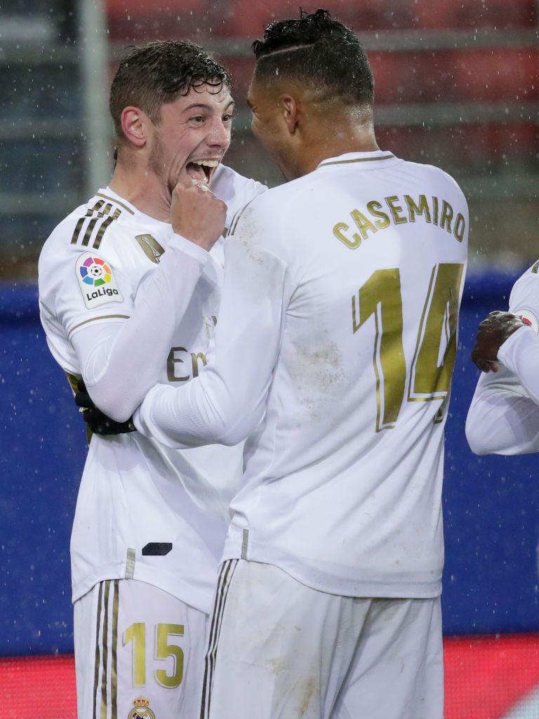 MADRID, SPAIN - NOVEMBER 23 : Federico Valverde (R) of Real Madrid celebrates with his teammate Carlos Casemiro (L) after scoring during the Spanish league (La Liga) football match between Real Madrid CF and Real Sociedad at the Santiago Bernabeu Stadium in Madrid, Spain on November 23, 2019.  (Photo by Burak Akbulut/Anadolu Agency via Getty Images)