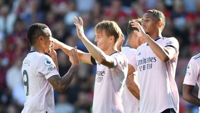 BOURNEMOUTH, ENGLAND - AUGUST 20: (2ndL) Martin Odegaard celebrates scoring the 2nd Arsenal goal with (L) Gabriel Jesus during the Premier League match between AFC Bournemouth and Arsenal FC at Vitality Stadium on August 20, 2022 in Bournemouth, England. (Photo by Stuart MacFarlane/Arsenal FC via Getty Images)