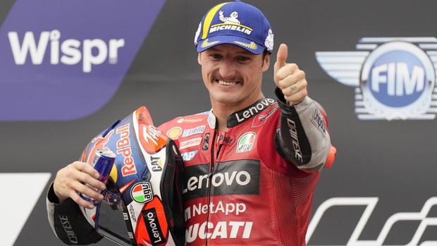 Australia's Jack Miller celebrates his third place on the podium of the Moto GP race as part of the Austrian motorcycle Grand Prix at the Red Bull Ring in Spielberg, Austria, Sunday, Aug. 21, 2022. (AP Photo/Florian Schroetter)