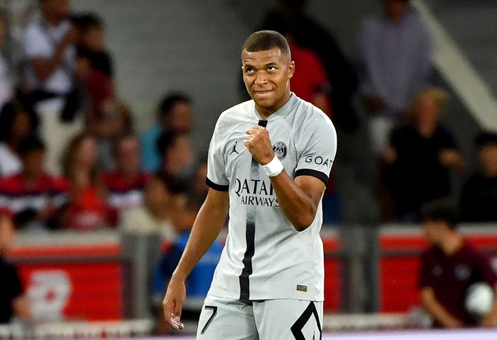 Paris Saint-Germains French forward Kylian Mbappe celebrates scoring his teams seventh goal during the French L1 football match between Lille OSC and Paris-Saint Germain (PSG) at Stade Pierre-Mauroy in Villeneuve-dAsq, northern France on August 21, 2022. (Photo by FRANCOIS LO PRESTI / AFP) (Photo by FRANCOIS LO PRESTI/AFP via Getty Images)