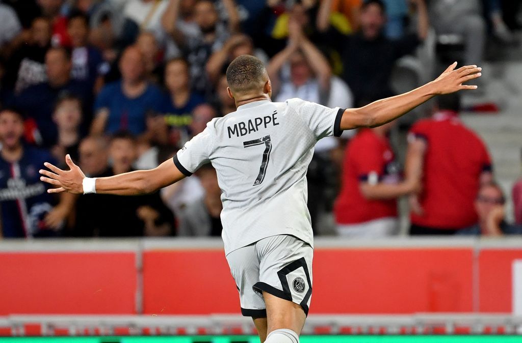 Paris Saint-Germain's French forward Kylian Mbappe celebrates scoring his team's seventh goal during the French L1 football match between Lille OSC and Paris-Saint Germain (PSG) at Stade Pierre-Mauroy in Villeneuve-d'Asq, northern France on August 21, 2022. (Photo by DENIS CHARLET / AFP) (Photo by DENIS CHARLET/AFP via Getty Images)
