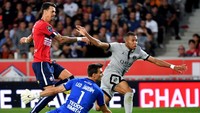 Mbappe mencetak gol keduanya ke gawang Lille pada menit ke-66. Bintang Prancis itu mendapat assist dari Neymar dan menyepak bola keras yang menggetarkan jala tim tuan rumah. Denis Charlet/AFP/Getty Images