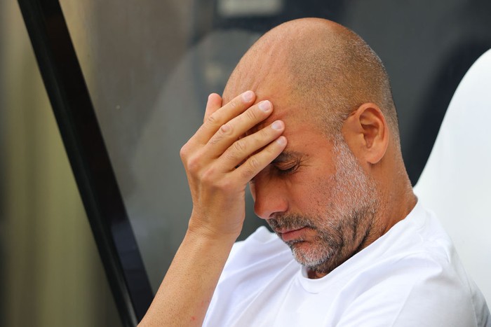 NEWCASTLE UPON TYNE, ENGLAND - AUGUST 21: Josep Pep Guardiola, manager of Manchester City, looks dejected during the Premier League match between Newcastle United and Manchester City at St. James Park on August 21, 2022 in Newcastle upon Tyne, England. (Photo by James Gill - Danehouse/Getty Images)