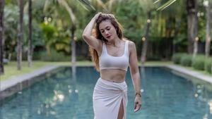 Bikin Iri, Wulan Guritno Pamer Perut Rata