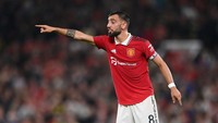 Bruno Fernandes masih akan menjadi pengatur serangan MU. Kepiawaiannya dalam mengirim umpan akan menjadi total, sebab peran sebagai penghubung kini sudah diemban Eriksen. (Foto: Getty Images/Michael Regan)