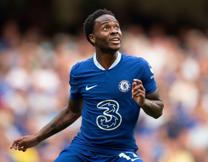 LEEDS, ENGLAND - AUGUST 21: Raheem Sterling of Chelsea is challenged by Rasmus Kristensen of Leeds United during the Premier League match between Leeds United and Chelsea FC at Elland Road on August 21, 2022 in Leeds, England. (Photo by Michael Regan/Getty Images)