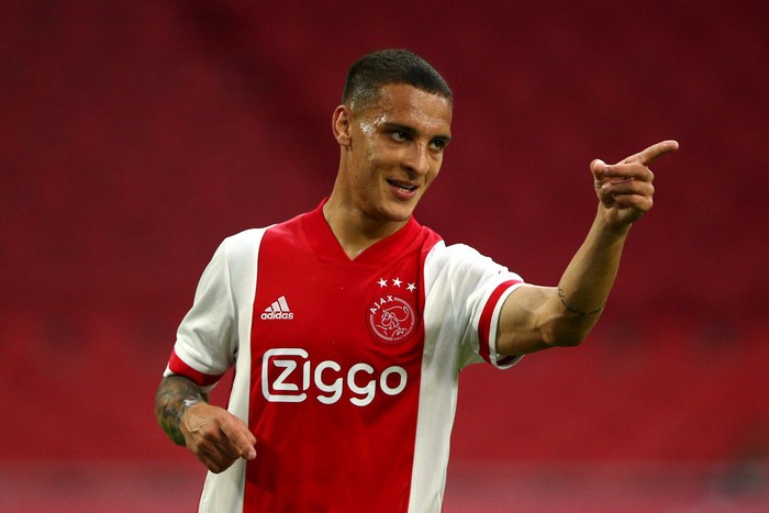 AMSTERDAM, NETHERLANDS - AUGUST 08:   Antony of Ajax celebrates scoring his teams fifth goal of the game during the pre-season friendly match between Ajax Amsterdam and RKC Waalwijk at Johan Cruijff Arena on August 08, 2020 in Amsterdam, Netherlands. (Photo by Dean Mouhtaropoulos/Getty Images)
