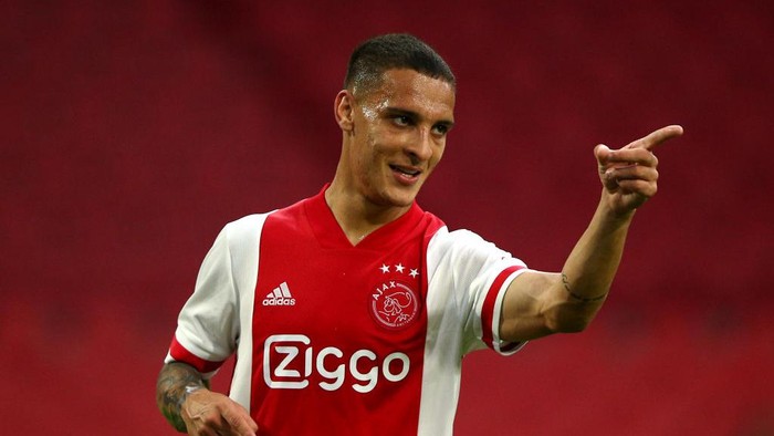 AMSTERDAM, NETHERLANDS - AUGUST 08:   Antony of Ajax celebrates scoring his teams fifth goal of the game during the pre-season friendly match between Ajax Amsterdam and RKC Waalwijk at Johan Cruijff Arena on August 08, 2020 in Amsterdam, Netherlands. (Photo by Dean Mouhtaropoulos/Getty Images)
