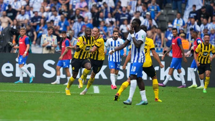 BERLIN, GERMANY - AUGUST 27: Anthony Modeste of Borussia Dortmund celebrates scoring his teams first goal during the Bundesliga match between Hertha BSC and Borussia Dortmund at Olympiastadion on August 27, 2022 in Berlin, Germany. (Photo by Ulrik Pedersen/DeFodi Images via Getty Images)