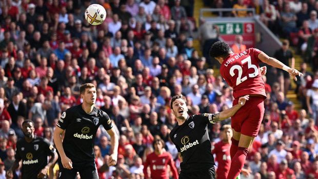 Liverpool's Colombian midfielder Luis Diaz (R) jumps to head home the opening goal of the English Premier League football match between Liverpool and Bournemouth at Anfield in Liverpool, north west England on August 27, 2022. - - RESTRICTED TO EDITORIAL USE. No use with unauthorized audio, video, data, fixture lists, club/league logos or 'live' services. Online in-match use limited to 120 images. An additional 40 images may be used in extra time. No video emulation. Social media in-match use limited to 120 images. An additional 40 images may be used in extra time. No use in betting publications, games or single club/league/player publications. (Photo by Oli SCARFF / AFP) / RESTRICTED TO EDITORIAL USE. No use with unauthorized audio, video, data, fixture lists, club/league logos or 'live' services. Online in-match use limited to 120 images. An additional 40 images may be used in extra time. No video emulation. Social media in-match use limited to 120 images. An additional 40 images may be used in extra time. No use in betting publications, games or single club/league/player publications. / RESTRICTED TO EDITORIAL USE. No use with unauthorized audio, video, data, fixture lists, club/league logos or 'live' services. Online in-match use limited to 120 images. An additional 40 images may be used in extra time. No video emulation. Social media in-match use limited to 120 images. An additional 40 images may be used in extra time. No use in betting publications, games or single club/league/player publications. (Photo by OLI SCARFF/AFP via Getty Images)