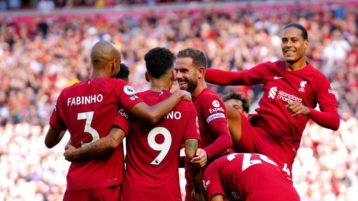 Liverpools Roberto Firmino celebrates with his team-mates after scoring their sides seventh goal of the game during the Premier League match at Anfield, Liverpool. Picture date: Saturday August 27, 2022. (Photo by Peter Byrne/PA Images via Getty Images)