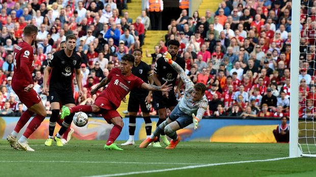 LIVERPOOL, ENGLAND - AUGUST 27:  ( THE SUN OUT,THE SUN ON SUNDAY OUT) Roberto Firmino of Liverpool scores the seventh goal making the score 7-0 during the Premier League match between Liverpool FC and AFC Bournemouth at Anfield on August 27, 2022 in Liverpool, England. (Photo by John Powell/Liverpool FC via Getty Images)