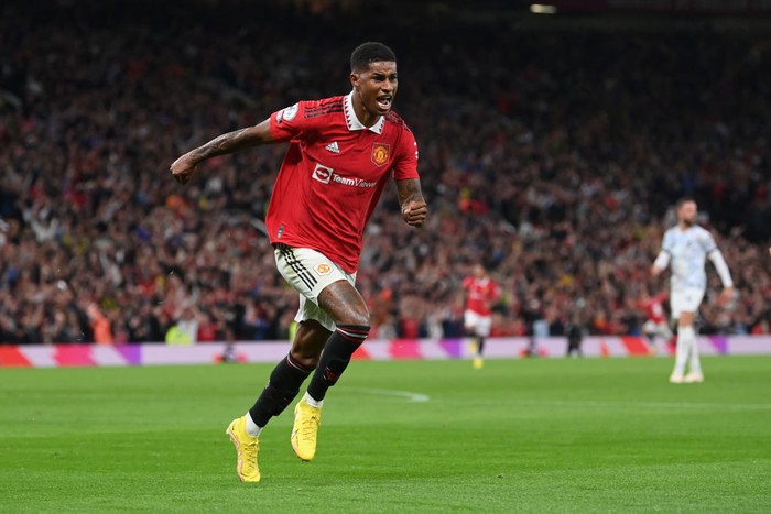 MANCHESTER, ENGLAND - AUGUST 22: Marcus Rashford of Manchester United celebrates scoring a goal to make it 2-0 during the Premier League match between Manchester United and Liverpool FC at Old Trafford on August 22, 2022 in Manchester, England. (Photo by Michael Regan/Getty Images)